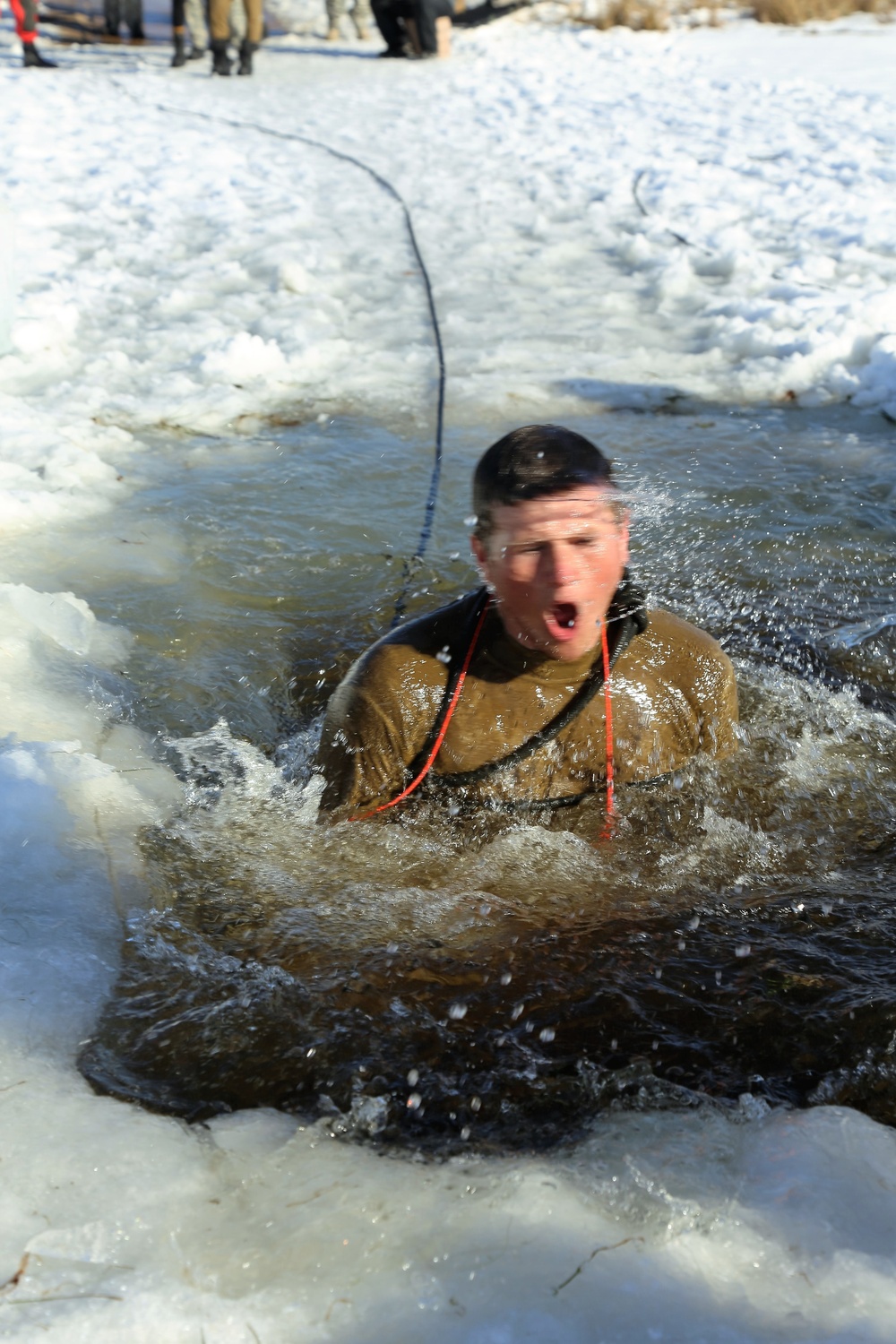 Cold-Weather Operations Course Class 18-04 students complete cold-water immersion training at Fort McCoy