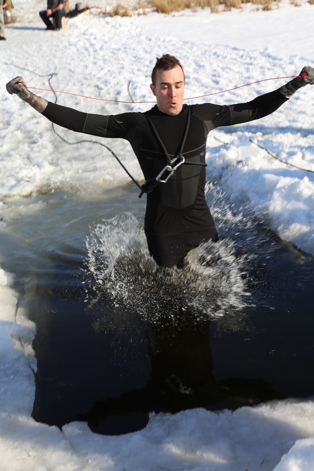 Cold-Weather Operations Course Class 18-04 students complete cold-water immersion training at Fort McCoy