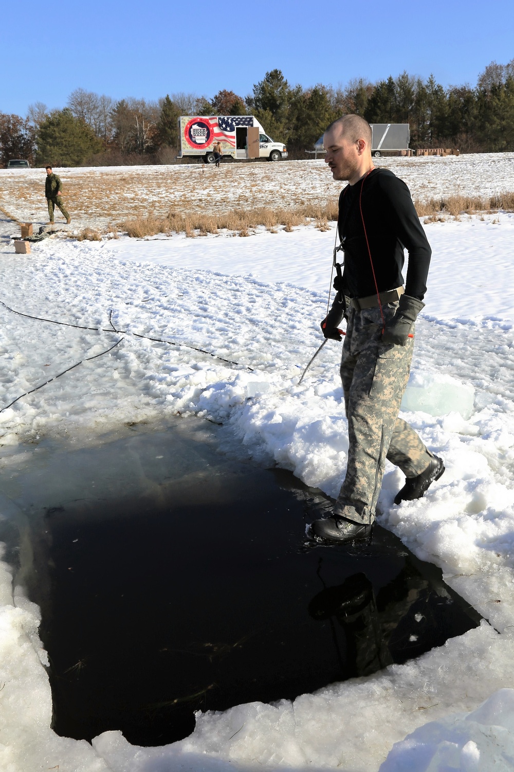 Cold-Weather Operations Course Class 18-04 students complete cold-water immersion training at Fort McCoy