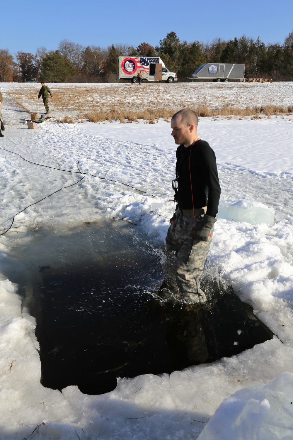 Cold-Weather Operations Course Class 18-04 students complete cold-water immersion training at Fort McCoy