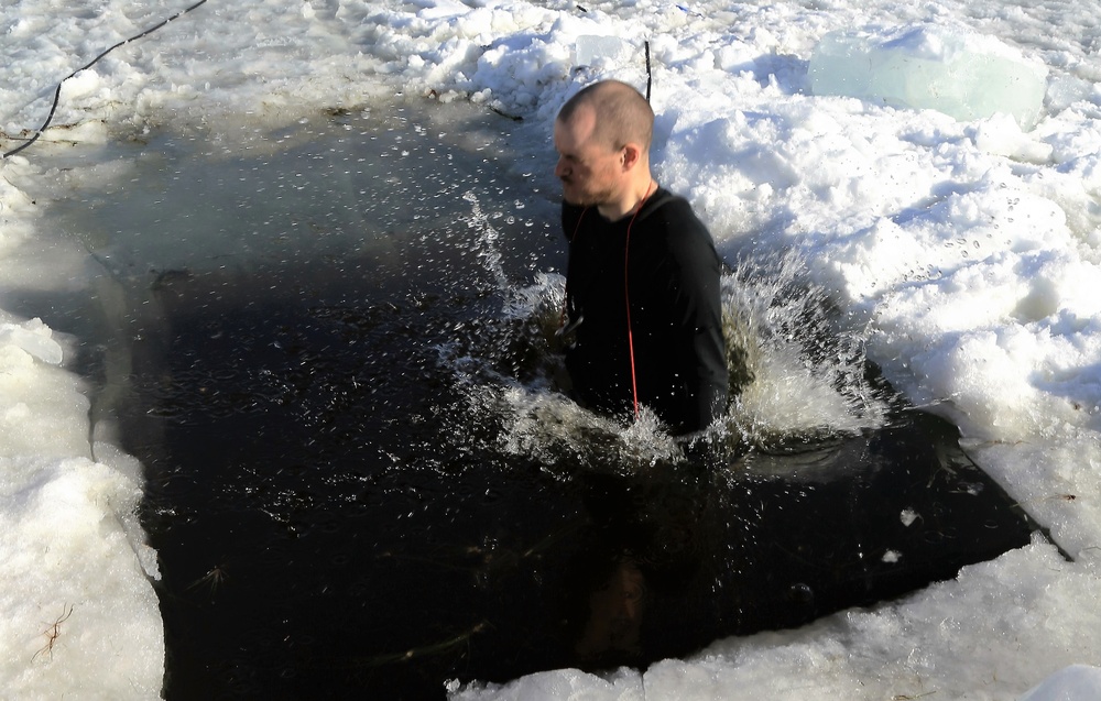 Cold-Weather Operations Course Class 18-04 students complete cold-water immersion training at Fort McCoy