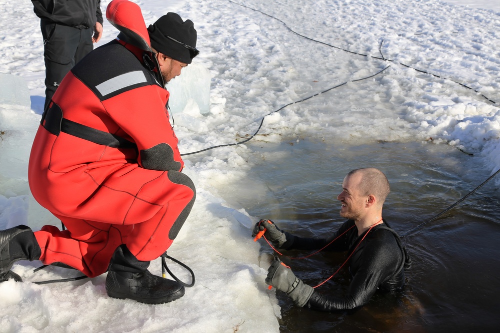 Cold-Weather Operations Course Class 18-04 students complete cold-water immersion training at Fort McCoy