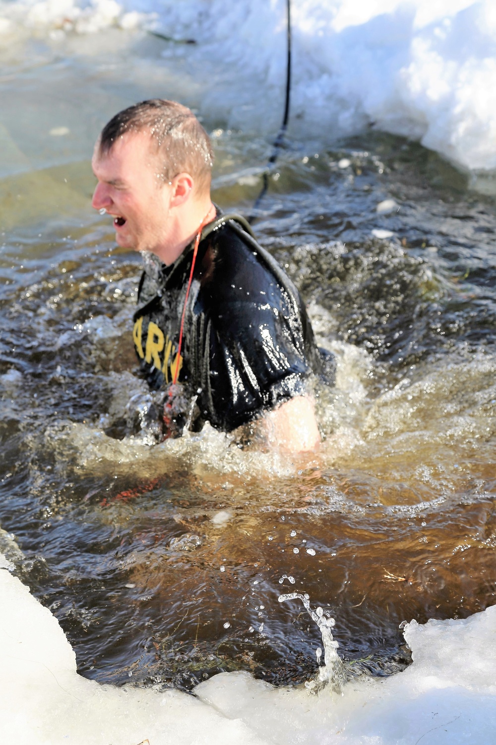 Cold-Weather Operations Course Class 18-04 students complete cold-water immersion training at Fort McCoy