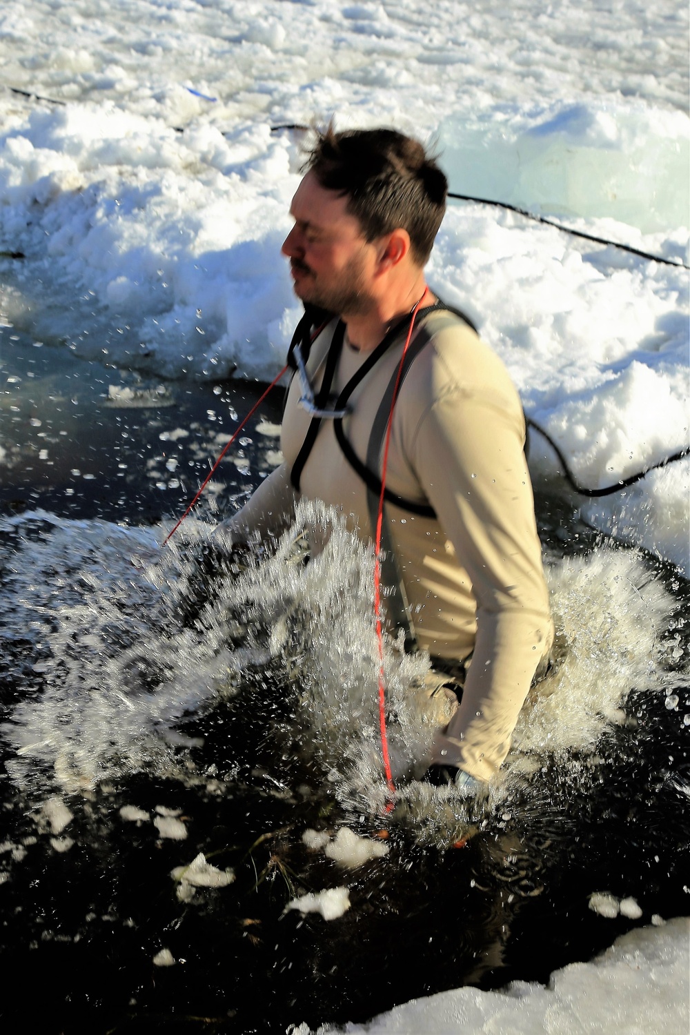 Cold-Weather Operations Course Class 18-04 students complete cold-water immersion training at Fort McCoy