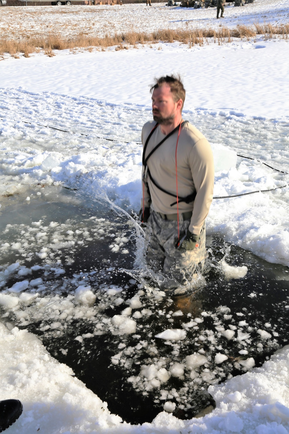 Cold-Weather Operations Course Class 18-04 students complete cold-water immersion training at Fort McCoy