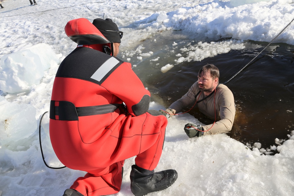 Cold-Weather Operations Course Class 18-04 students complete cold-water immersion training at Fort McCoy