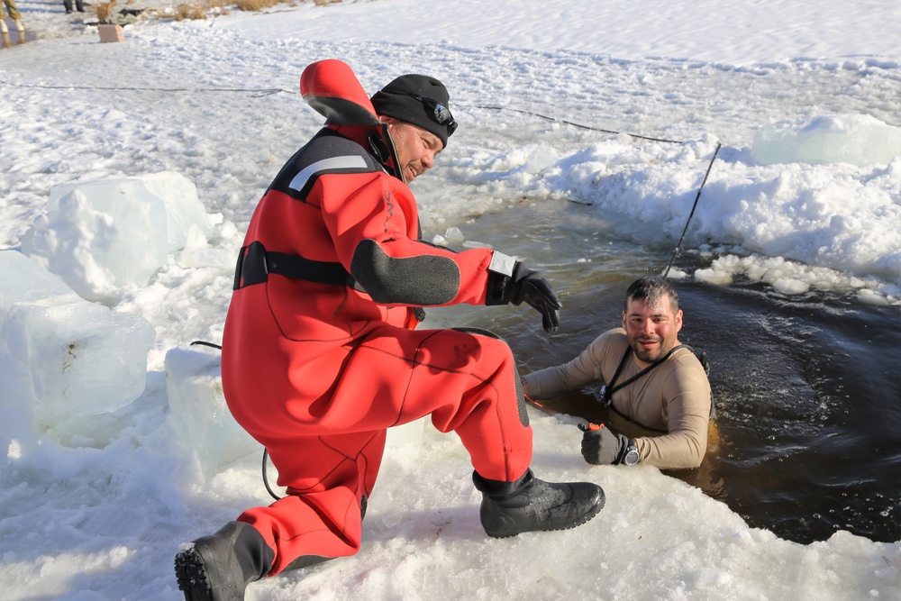 Cold-Weather Operations Course Class 18-04 students complete cold-water immersion training at Fort McCoy