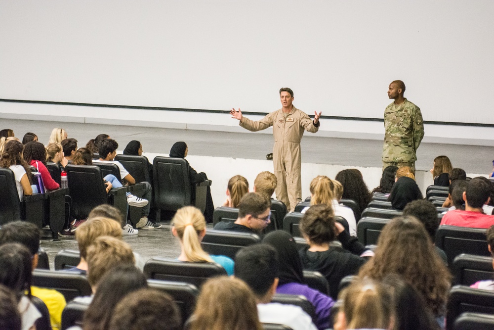 Eighth grade students learn about the mission of Al Udeid Air Base