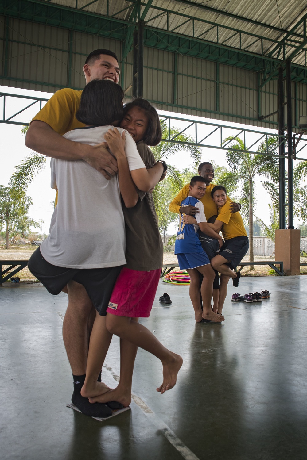 USS Bonhomme Richard (LHD 6) Sailors visit the Child Protection and Development Center as part of COMREL