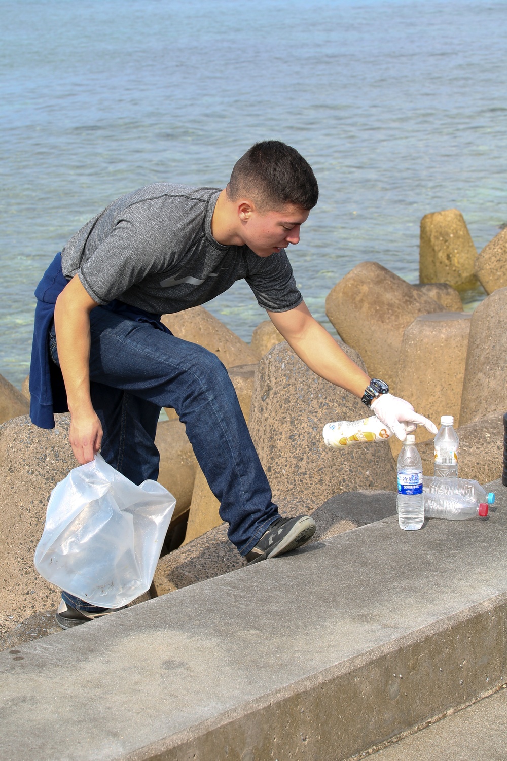 Single Marine Program volunteers clean up Sunabe Seawall