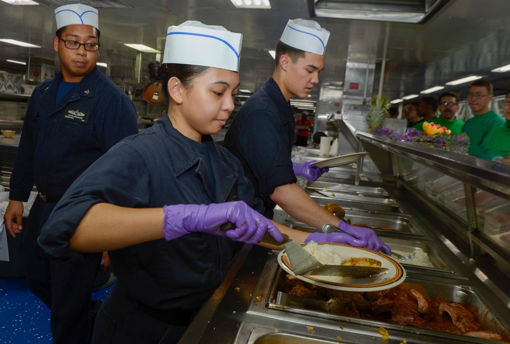 Sailors prepare dinner aboard USNS Mercy