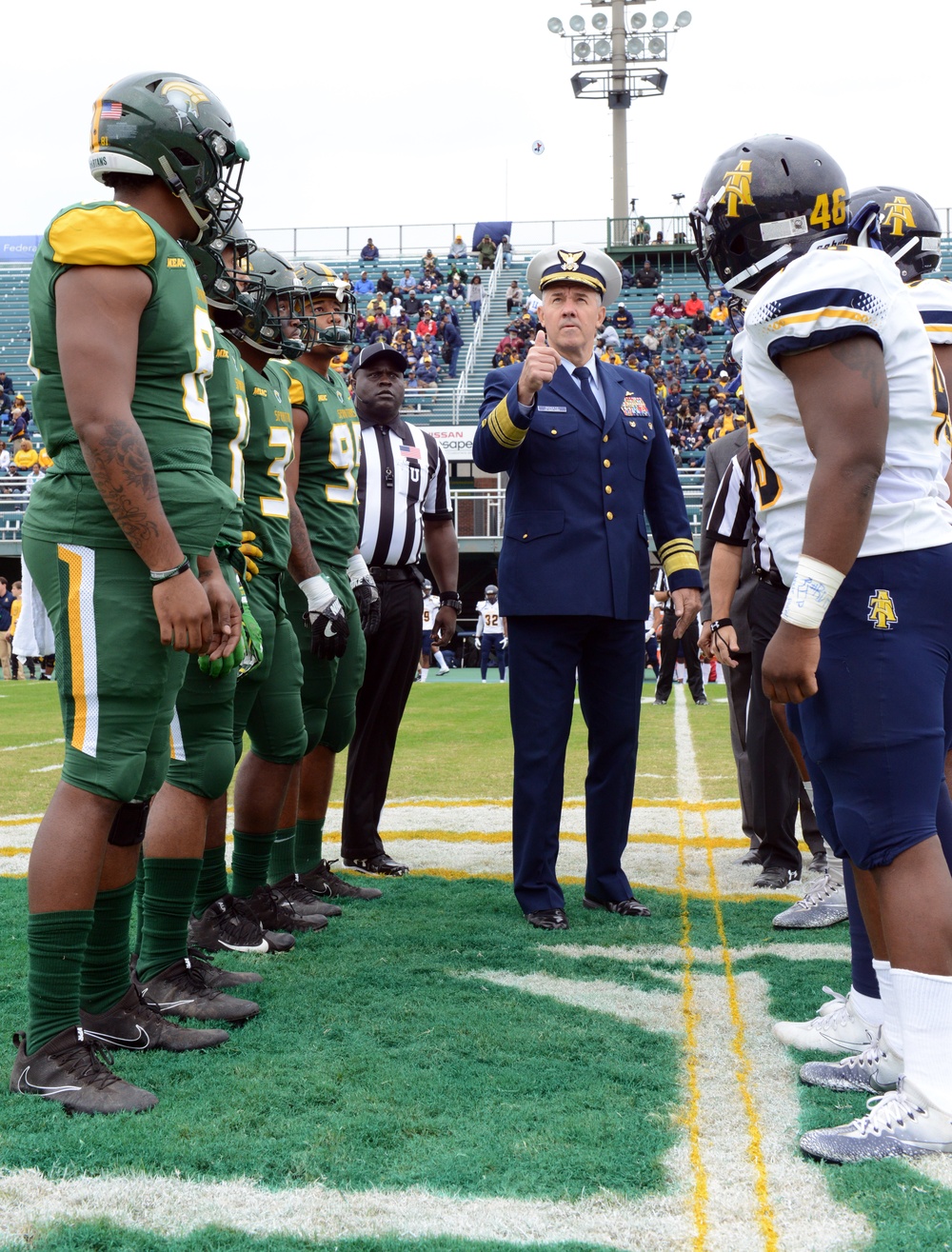 Coast Guard Atlantic Area Commander flips game coin at Norfolk State University