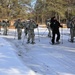 Cold-Weather Operations Course Class 18-05 students practice snowshoeing at Fort McCoy