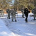 Cold-Weather Operations Course Class 18-05 students practice snowshoeing at Fort McCoy