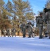 Cold-Weather Operations Course Class 18-05 students practice snowshoeing at Fort McCoy