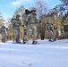 Cold-Weather Operations Course Class 18-05 students practice snowshoeing at Fort McCoy