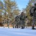 Cold-Weather Operations Course Class 18-05 students practice snowshoeing at Fort McCoy