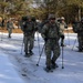 Cold-Weather Operations Course Class 18-05 students practice snowshoeing at Fort McCoy