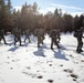 Cold-Weather Operations Course Class 18-05 students practice snowshoeing at Fort McCoy