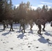 Cold-Weather Operations Course Class 18-05 students practice snowshoeing at Fort McCoy