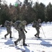 Cold-Weather Operations Course Class 18-05 students practice snowshoeing at Fort McCoy