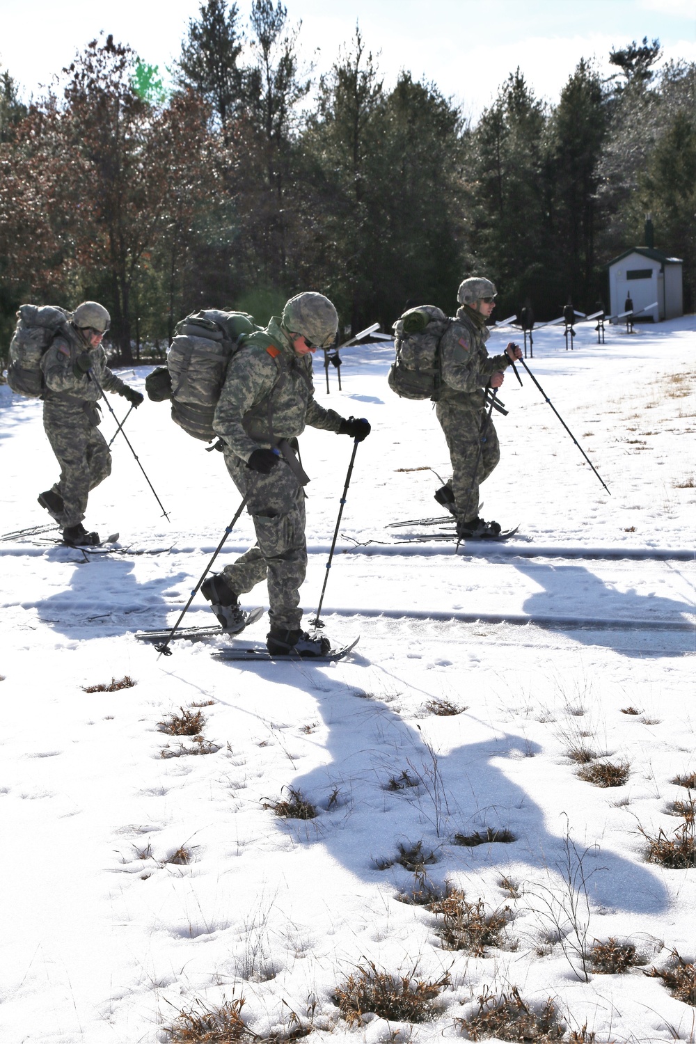 Cold-Weather Operations Course Class 18-05 students practice snowshoeing at Fort McCoy