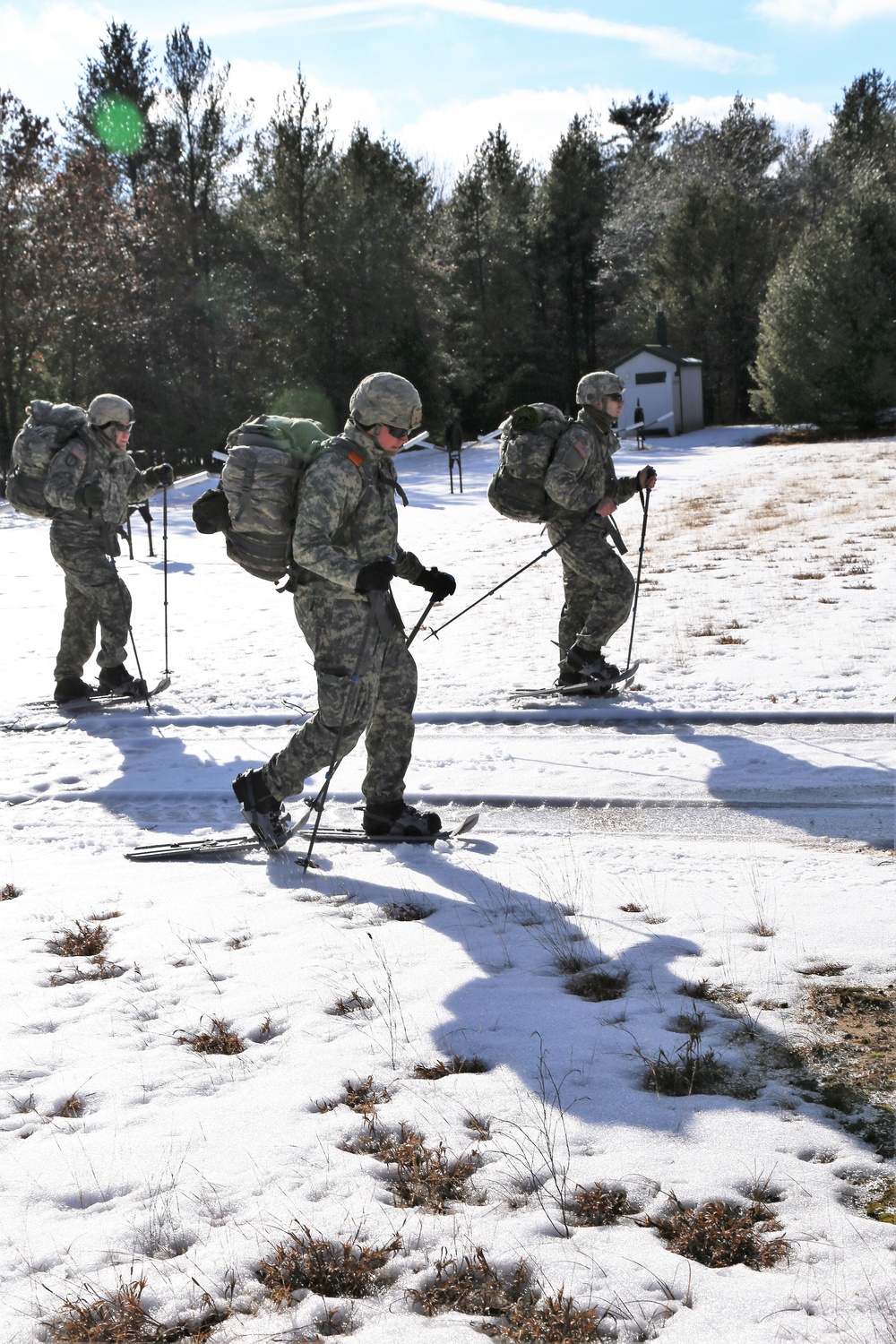 Cold-Weather Operations Course Class 18-05 students practice snowshoeing at Fort McCoy