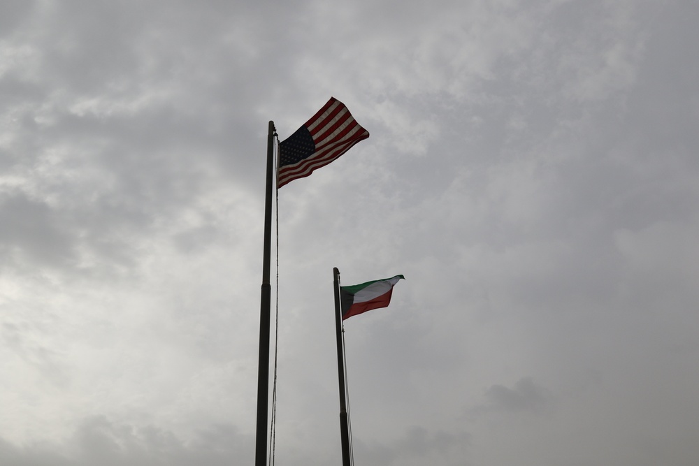 A new Kuwaiti flag flies over Camp Patriot