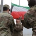 U.S. Soldiers replace Kuwaiti flag over Camp Patriot before Liberation Day