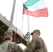 U.S. Soldiers replace Kuwaiti flag over Camp Patriot before Liberation Day