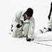 Cold-Weather Operations Course Class 18-06 students build Arctic tents during training at Fort McCoy