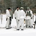 Cold-Weather Operations Course Class 18-06 students build Arctic tents during training at Fort McCoy