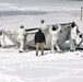 Cold-Weather Operations Course Class 18-06 students build Arctic tents during training at Fort McCoy