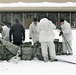 Cold-Weather Operations Course Class 18-06 students build Arctic tents during training at Fort McCoy