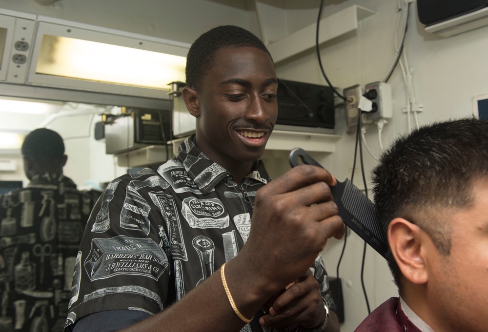 Sailors Get Hair Cuts Aboard USS Sampson