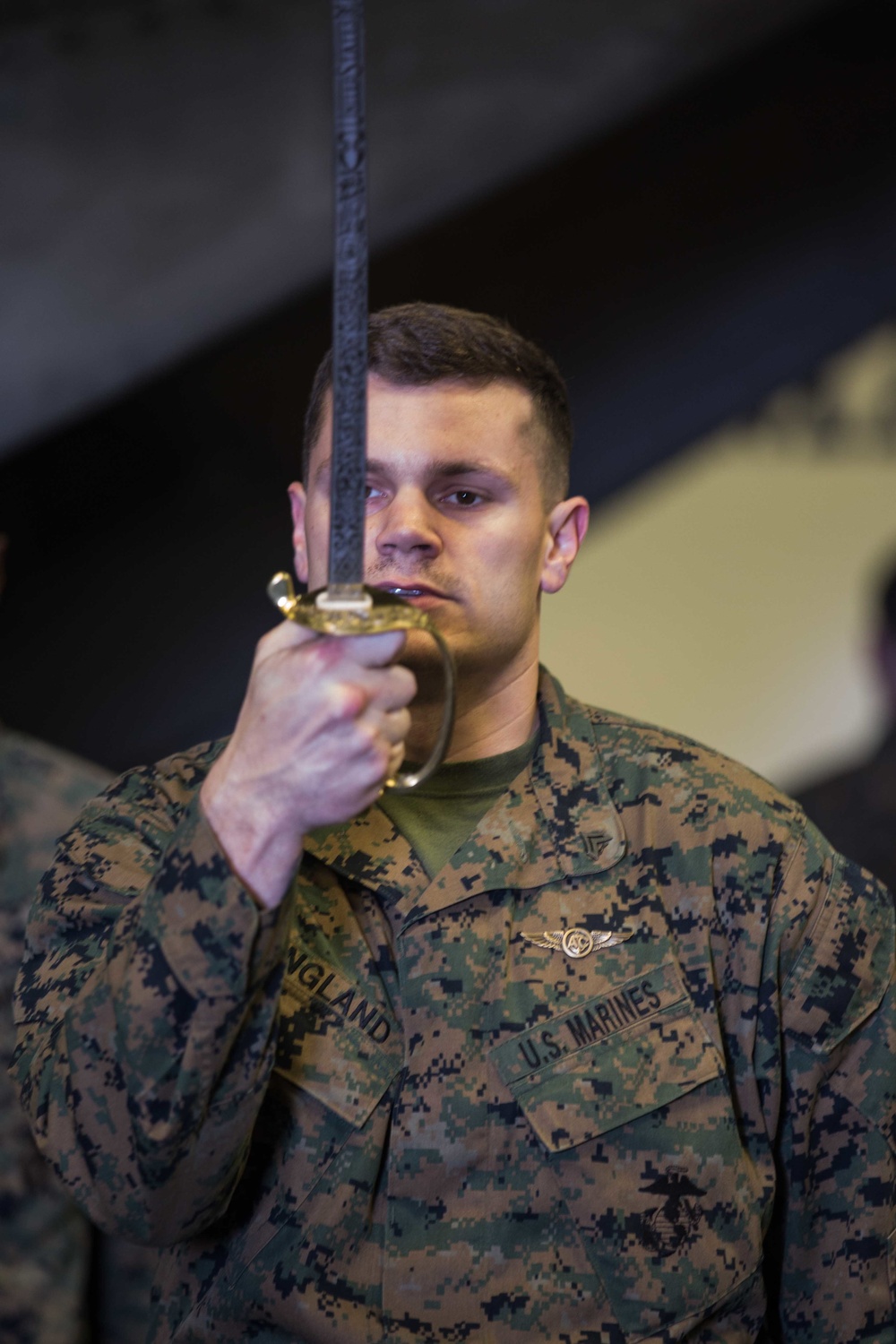 Draw! 26th MEU Marines practice sword and guide-on during Corporals Course at sea