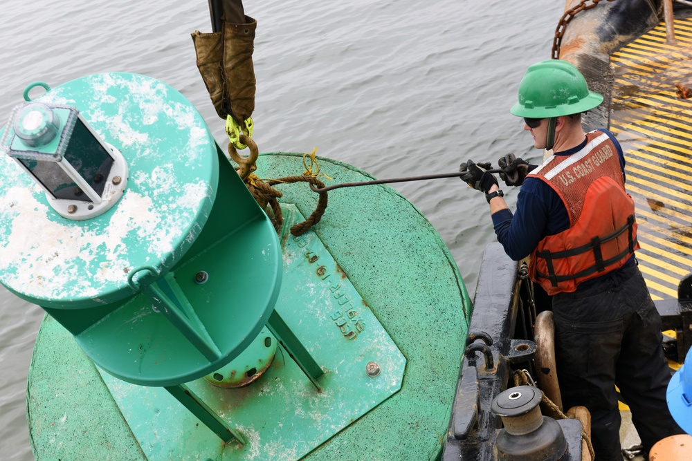 Coast Guard Cutter Frank Drew crew services buoys on the Elizabeth, James Rivers in Va.