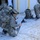 Cold-Weather Operations Course Class 18-05 students practice snowshoeing at Fort McCoy