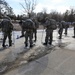 Cold-Weather Operations Course Class 18-05 students practice snowshoeing at Fort McCoy