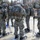 Cold-Weather Operations Course Class 18-05 students practice snowshoeing at Fort McCoy