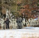 Cold-Weather Operations Course Class 18-05 students practice snowshoeing at Fort McCoy