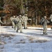 Cold-Weather Operations Course Class 18-05 students practice snowshoeing at Fort McCoy