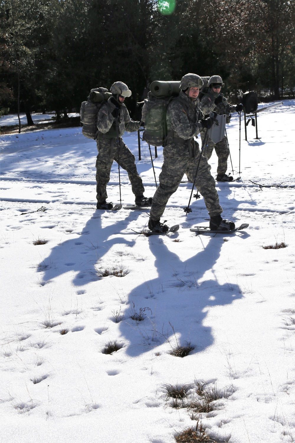 Cold-Weather Operations Course Class 18-05 students practice snowshoeing at Fort McCoy