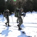 Cold-Weather Operations Course Class 18-05 students practice snowshoeing at Fort McCoy