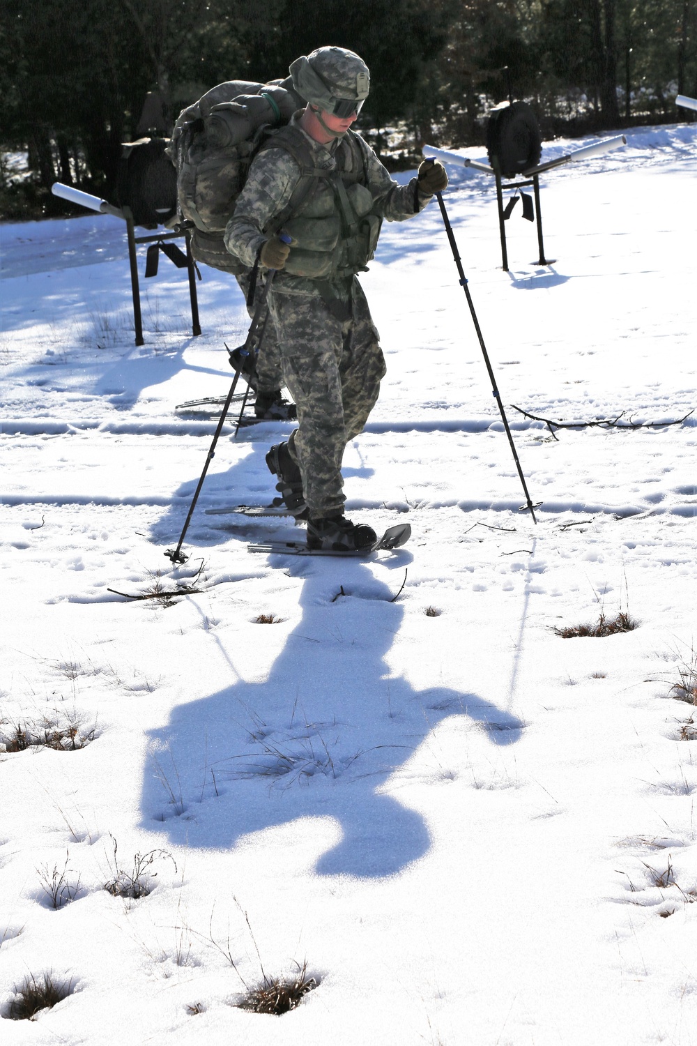 Cold-Weather Operations Course Class 18-05 students practice snowshoeing at Fort McCoy