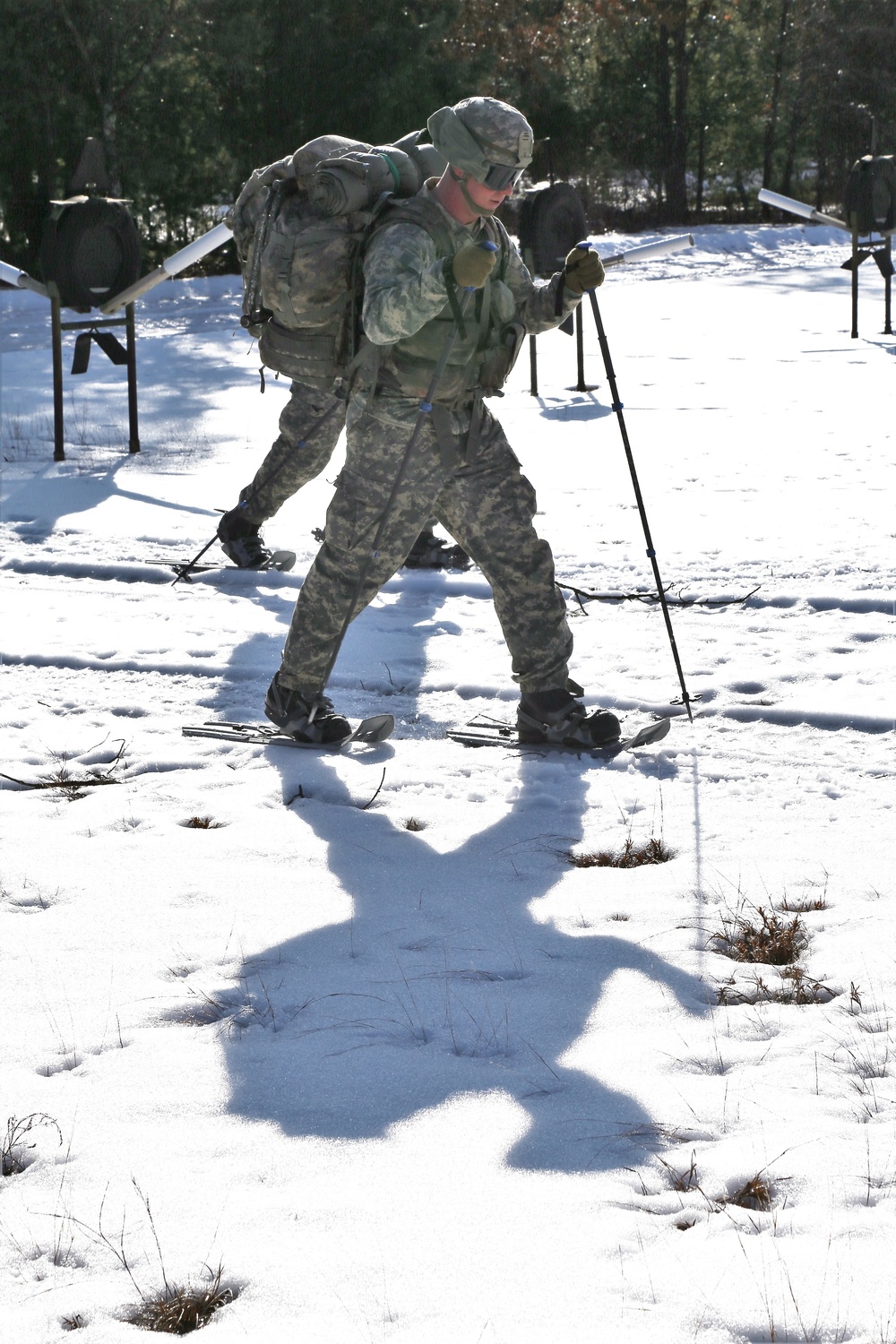 Cold-Weather Operations Course Class 18-05 students practice snowshoeing at Fort McCoy