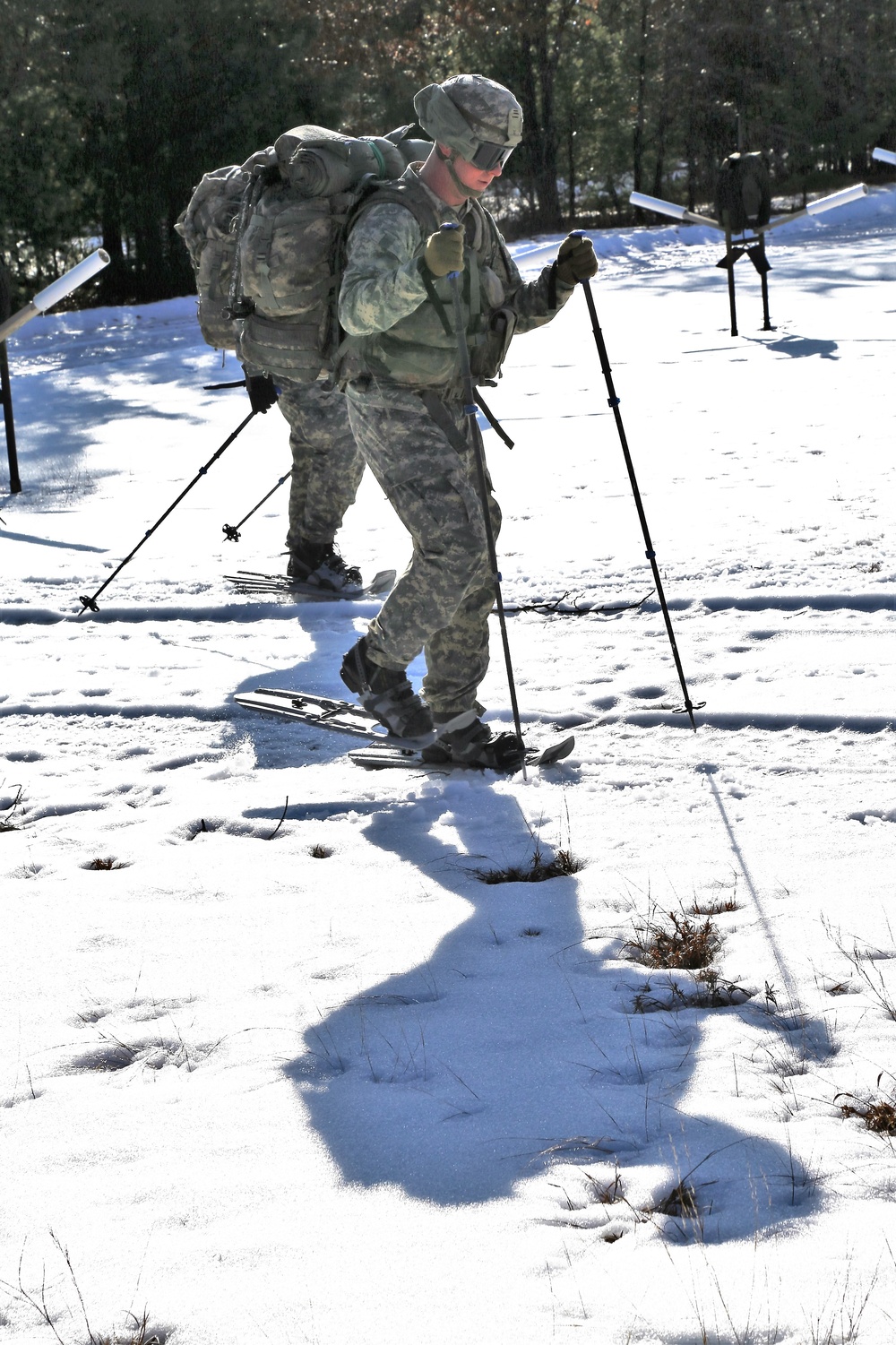 Cold-Weather Operations Course Class 18-05 students practice snowshoeing at Fort McCoy