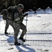 Cold-Weather Operations Course Class 18-05 students practice snowshoeing at Fort McCoy