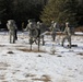 Cold-Weather Operations Course Class 18-05 students practice snowshoeing at Fort McCoy