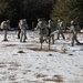 Cold-Weather Operations Course Class 18-05 students practice snowshoeing at Fort McCoy